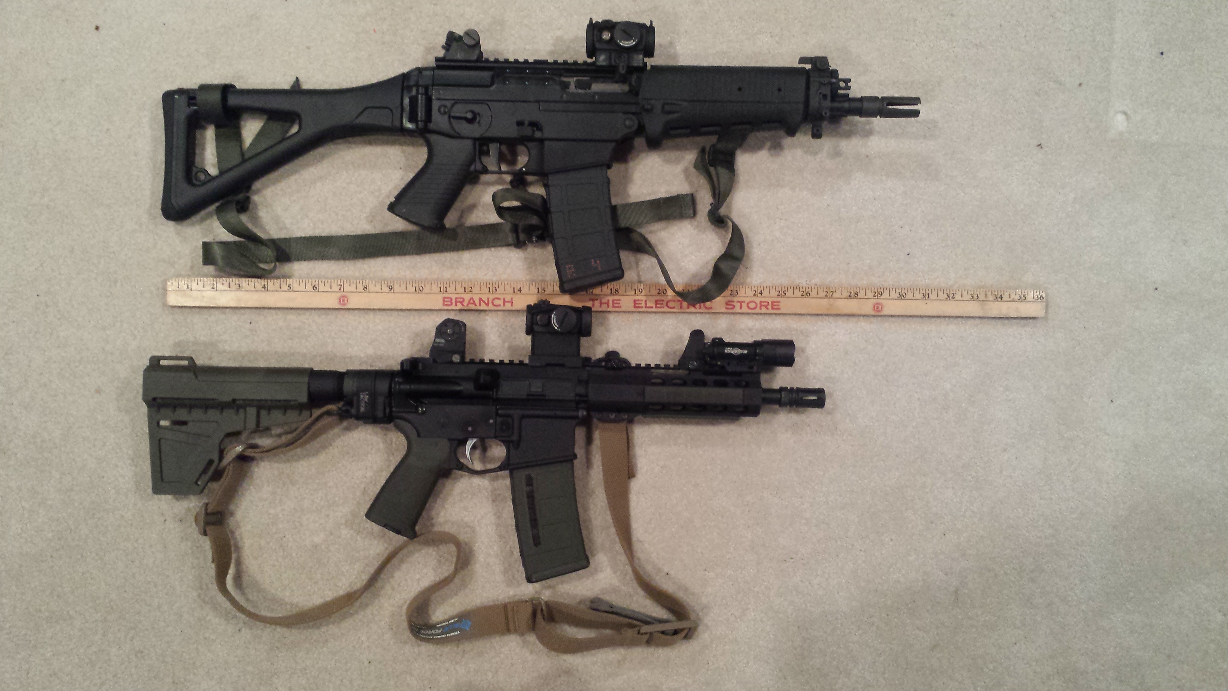 Sig 556 SBR (top); AR Pistol (bottom) .